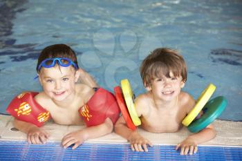 Young boys in swimming pool
