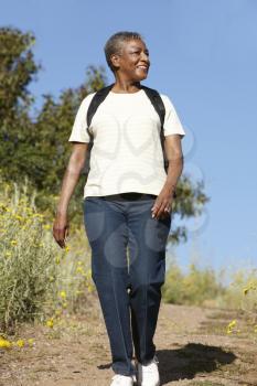 Senior  woman on country hike