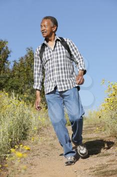 Senior  man on country hike
