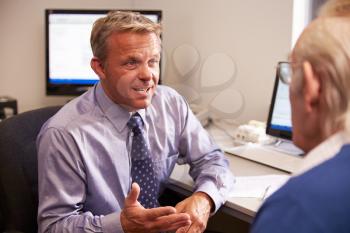Doctor Discussing Test Results With Senior Male Patient