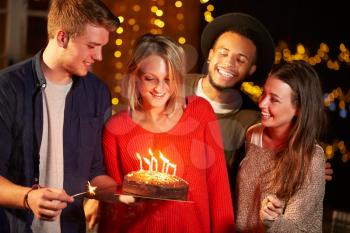 Group Of Friends Celebrating Birthday At Outdoor Party