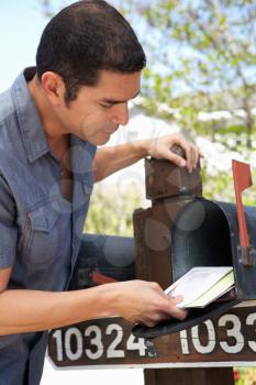 Hispanic Man Checking Mailbox
