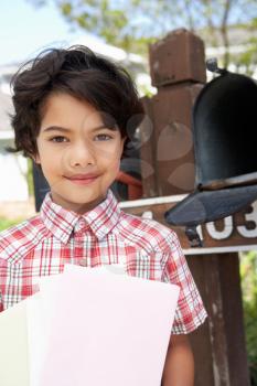Hispanic Boy Checking Mailbox