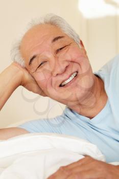 Senior Taiwanese man resting