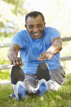 Senior African American Man Exercising In Park