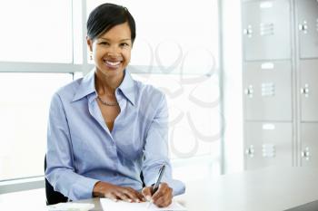 African American woman working at desk