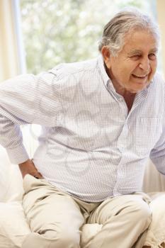Elderly Hispanic man with backache