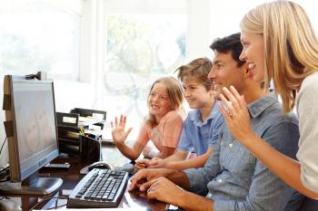 Family using skype in home office