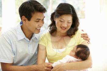 Asian couple with baby