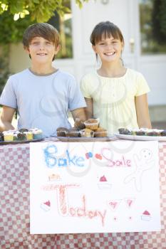 Children Holding Bake Sale
