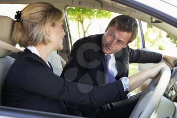 Two Business Colleagues Car Pooling Journey Into Work