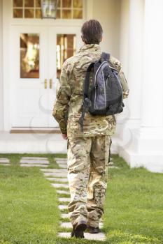 Back View Of Soldier Returning Home