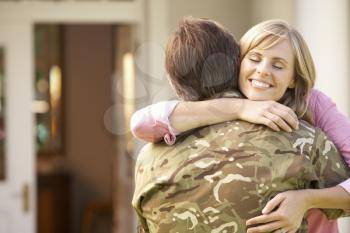 Soldier Returning Home And Greeted By Wife