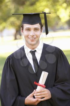 Male Student Attending Graduation Ceremony