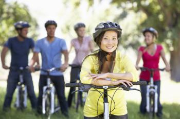 Group Of Young Friends On Cycle Ride In Countryside