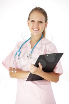 Studio Portrait Of Nurse Against White Background
