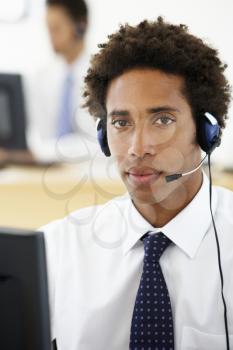 Service Agent Talking To Customer In Call Centre