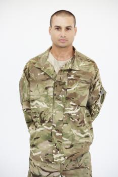 Studio Portrait Of Soldier Wearing Uniform