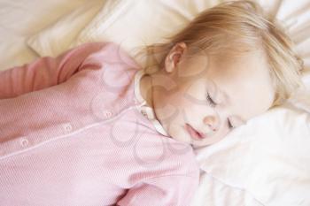 Young Girl Sleeping In Bed