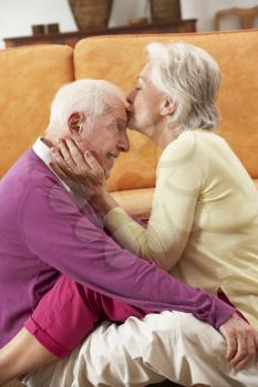 Romantic Senior Couple Relaxing At Home