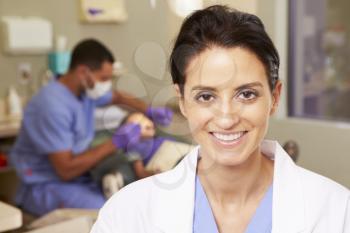 Portrait Of Dental Nurse In Dentists Surgery
