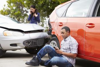 Male Driver Making Phone Call After Traffic Accident