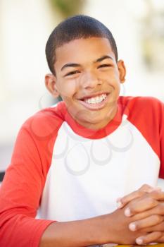 Portrait Of Smiling Teenage Boy