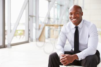 Smiling African American businessman, horizontal portrait