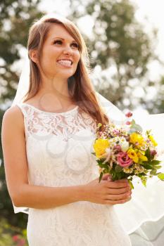 Beautiful Bride Holding Bouquet On Wedding Day