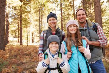 Group portrait of family on hike in forest, California, USA