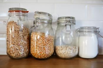 Close Up Of Storage Jars In Kitchen