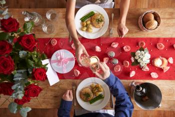 Overhead View Of Romantic Couple At Valentines Day Meal