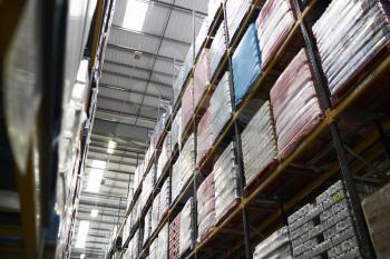 Low angle view of stock stored in a distribution warehouse