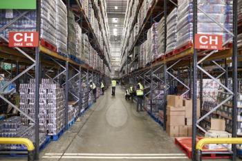 ESSEX, ENGLAND- MAR 13 2016: Stored goods in supermarket distribution warehouse, low angle