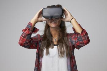 Studio Portrait Of Video Game Designer Wearing VR Headset