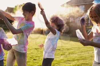 Children Celebrating Holi Festival With Paint Party