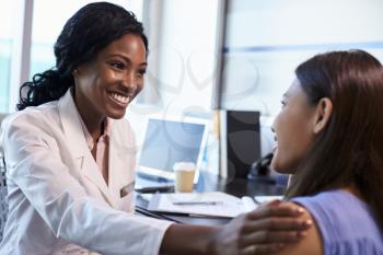 Doctor Wearing White Coat Meeting With Female Patient