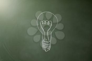 Lightbulb drawn on a chalkboard, horizontal
