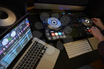 Cut in of DJ Decks and Laptop Computer