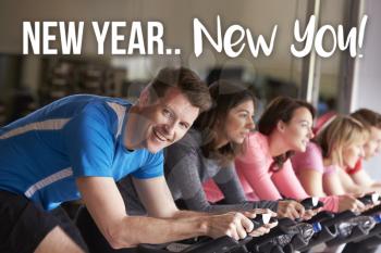 New Year New You! Man exercise at spinning class at a gym