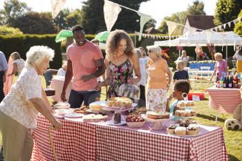 Busy Cake Stall At Summer Garden Fete