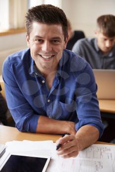 Portrait Of Mature Male Student Attending Adult Education Class