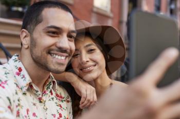 Couple Posing For Selfie On Street In New York City
