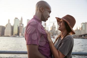 Romantic Young Couple With Manhattan Skyline In Background