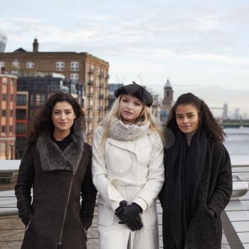 Portrait Of Female Friends Visiting London In Winter