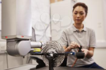 Female Engineer Uses CMM Coordinate Measuring Machine In Factory