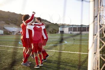Male High School Soccer Players Having Team Talk