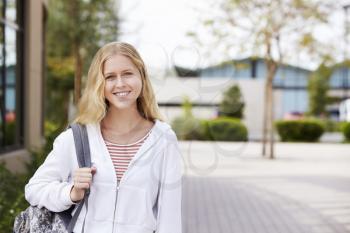 Portrait Of Female High School Student Outside College Buildings