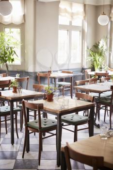 Tables Laid For Service In Empty Restaurant