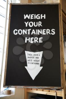 Weigh Your Container Sign In Sustainable Plastic Free Grocery Store